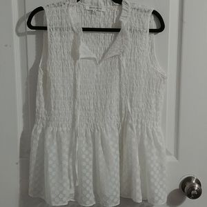 White sleeveless top